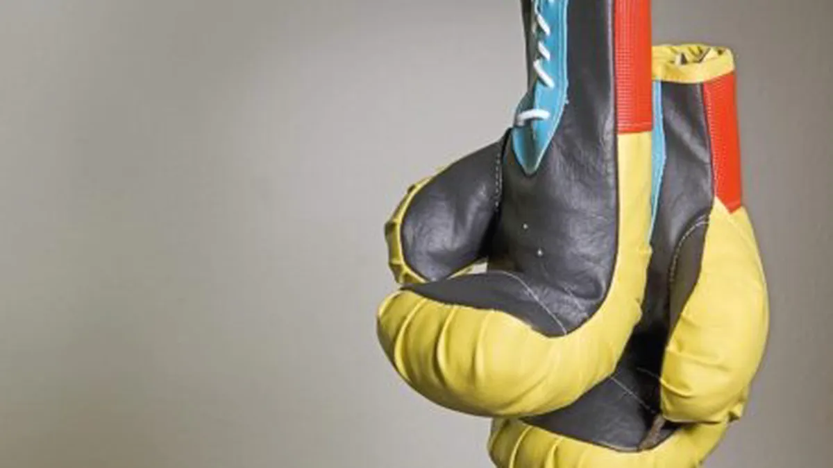 Design visual de um slot com tema de boxe e esportes de combate